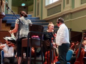 John Toal of BBC's Radio Ulster interviews MYSO musicians at Ulster Hall in Belfast.